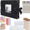 A black photo album with a picture of a wedding couple on the cover, surrounded by various craft supplies like pens, stickers, and stencils. Produktbild-Vorschau