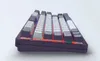 A close-up, angled view of a mechanical keyboard with RGB lighting. Produktbild-Vorschau