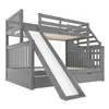 A grey wooden bunk bed with a slide and stairs, shown against a white background. Produktbild-Vorschau