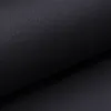 A close-up view of black faux leather material, showing its textured surface and a subtle curve. Produktbild-Vorschau