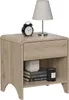 A wooden nightstand with a drawer and an open shelf, displaying a lamp, an alarm clock, books, and a candle. Podgląd zdjęcia produktu