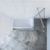 A top-down view of a bathtub with a glass shower screen. Produktbild-Vorschau