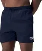 A person wearing navy blue Speedo swim shorts. Produktbild-Vorschau
