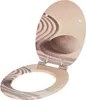 An open toilet seat with a zen garden design. Produktbild-Vorschau