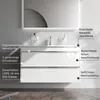 A white bathroom vanity with two drawers and a mirror above it. Produktbild-Vorschau