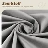 A close-up of gray velvet fabric, with text overlay describing its qualities. Produktbild-Vorschau