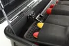 Close-up view inside an open tool case, showing several tools with red and yellow ends secured in black fabric holders. Podgląd zdjęcia produktu