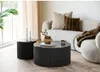 A living room scene with a sofa, coffee table, and side table. Voir les images du produit