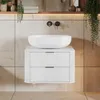 A modern bathroom vanity with a vessel sink and wall-mounted faucets. Produktbild-Vorschau
