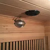 Two air purifiers are mounted on the wooden walls and ceiling of a sauna. Produktbild-Vorschau