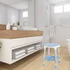 A modern bathroom with a vanity, sink, shower, and a shower stool. Produktbild-Vorschau