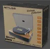 The image shows the product packaging for a Muse turntable stereo system. Voir les images du produit