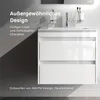 A white bathroom vanity with two drawers is shown, with text overlays describing its design and origin. Produktbild-Vorschau