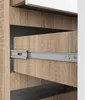 Close-up view of a drawer slide mechanism on a wooden shelf. Produktbild-Vorschau