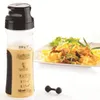 A GEFU SpätzleMix TWISTER bottle and a plate of Spätzle. Produktbild-Vorschau