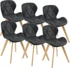 A set of six black dining chairs with wooden legs arranged on a white background. Produktbild-Vorschau