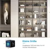 A mini camera is shown next to a bookshelf and with a diagram of its dimensions and battery life. Produktbild-Vorschau