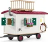 A toy caravan for horses, with a balcony, windows, and accessories. Produktbild-Vorschau