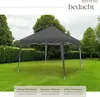 A dark gray pop-up gazebo is set up on a green lawn with trees in the background. Náhled obrázku produktu