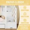 A close-up view of a white bunk bed ladder with storage drawers, featuring marketing text and icons on the right side. Produktbild-Vorschau