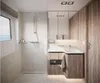 A modern bathroom with a shower and vanity area. Náhľad obrázku produktu