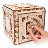 A 3D wooden puzzle safe is shown with a hand interacting with its dial. Produktbild-Vorschau