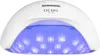 A white UV LED nail lamp with its lights on, showing the interior with blue light. Anteprima dell’immagine prodotto