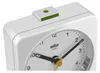 A close-up view of the top of a white Braun alarm clock. Podgląd zdjęcia produktu