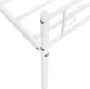 A close-up view of the corner of a white metal bed frame, showing the leg and connecting joints. Produktbild-Vorschau