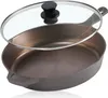 A cast iron frying pan with a glass lid, shown from a slightly elevated angle against a white background. Náhled obrázku produktu