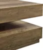 A close-up view of a wooden coffee table with two tiers. Produktbild-Vorschau