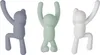 Three colorful Buddy Hooks shaped like climbing figures are displayed against a white background. Náhled obrázku produktu