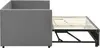 A side view of a gray sofa bed with the mattress frame extended. Produktbild-Vorschau