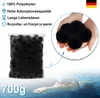 A bag of black filter balls is shown next to hands holding some of the balls, with a swimmer in the background. Voir les images du produit