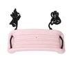 A pastel pink plastic swing seat with black ropes attached, isolated on a white background. Anteprima dell’immagine prodotto
