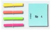 Four rolled-up colorful papers tied with rubber bands are on the left, and a light blue card with the number 4 is on the right. Produktbild-Vorschau