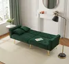 A green velvet sofa bed is shown in a living room setting with a fireplace and mirror in the background. Anteprima dell’immagine prodotto