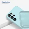 A close-up view of a light blue phone case, showing the camera cutout and the interior lining. Produktbild-Vorschau