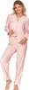 A woman is posing in a pink pajama set. Produktbild-Vorschau