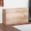 A wooden shoe cabinet in a room setting. Produktbild-Vorschau