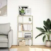 A living room scene with a sofa and a bookshelf. Podgląd zdjęcia produktu