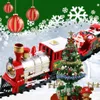 Roter und silberner Weihnachtszug mit dem Weihnachtsmann und einem geschmückten Weihnachtsbaum, umgeben von Geschenkboxen Produktbild-Vorschau
