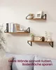 Three wooden shelves mounted on a white wall, decorated with books, a picture frame, a plant, a radio, and candle holders. A blurred couch is in the foreground. Produktbild-Vorschau