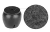A close-up view of a black chair leg cap with a magnified view of its felt bottom. Anteprima dell’immagine prodotto