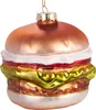 A glass ornament shaped like a hamburger, hanging from a gold string. Voir les images du produit