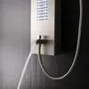A close-up view of a modern shower panel with water flowing from a hose. Podgląd zdjęcia produktu