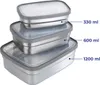 Three stackable stainless steel lunchboxes of different sizes. Produktbild-Vorschau