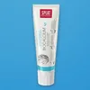 A tube of SPLAT Biocalcium toothpaste is shown against a solid light blue background. Produktbild-Vorschau