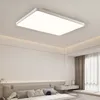 A modern bedroom with a rectangular ceiling light fixture. Produktbild-Vorschau