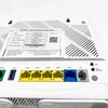 The back of a white Zyxel router with various ports and a label showing device information. Podgląd zdjęcia produktu